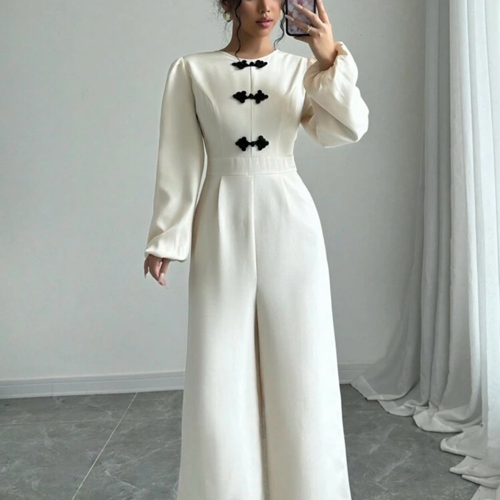 Elegant Cream Jumpsuit with Black Accents